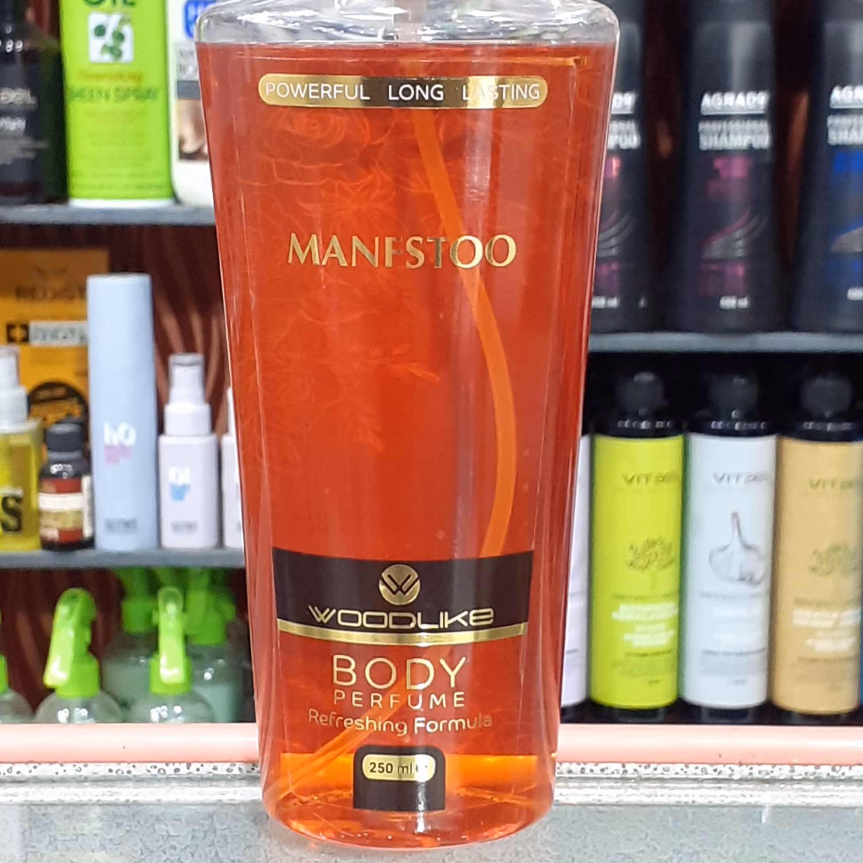 بادی اسپلش زنانه وودلایک  منفستو manfstoo رایحه گرم شیرین حجم 250 میل