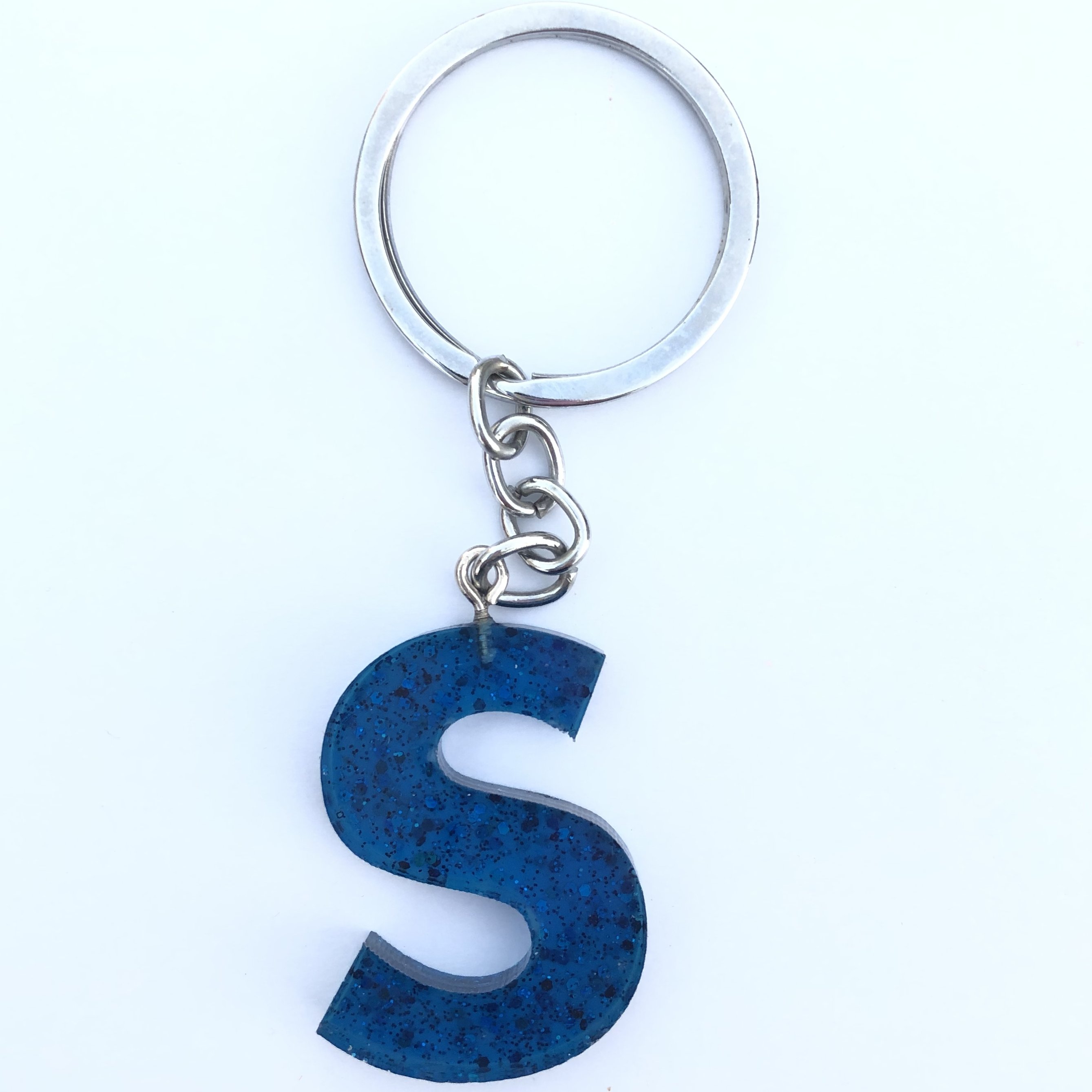 سر سوییچی حرف اس انگلیسی رزینی اکلیلی آبی رنگ