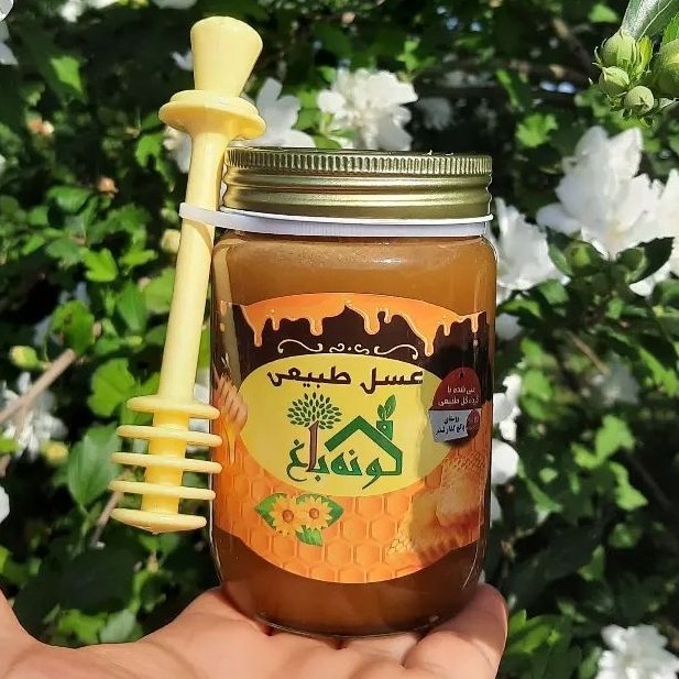 عسل طبیعی کنار غنی شده با گرده گلهای طبیعی محصول روستا در شیشه های 600 گرمی