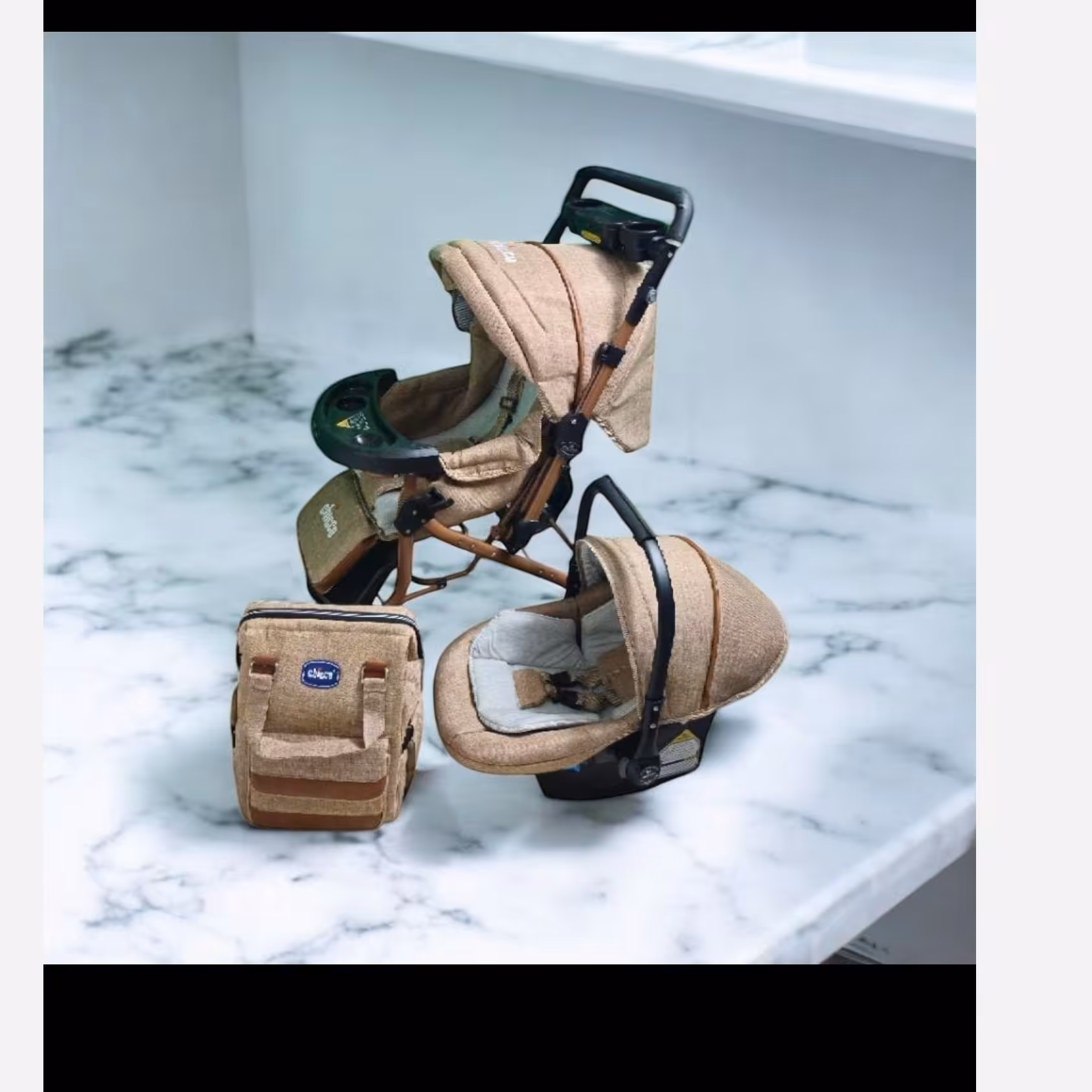 کالسکه چهار تکه  نوزاد با اسکلت ارابه  مدل CHICCO1   شامل کالسکه کیف کریر و روروئک 