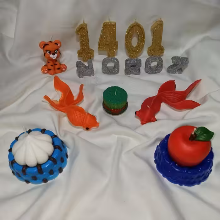 شمع سفره 7 سین عید قابل سفارش در رنگ های مختلف به صورت عمده و تک