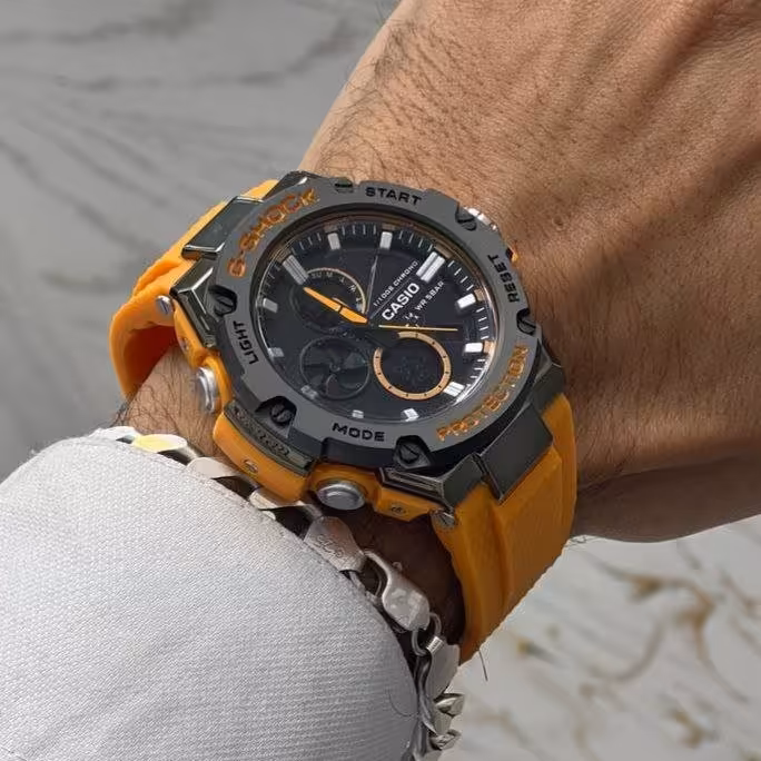 ساعت کاسیو جی شاک بند نارنجی
دو زمانه موتور ژاپن