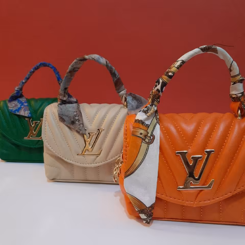 کیف دخترانه چرمی مصنوعی دسته پارچه ای