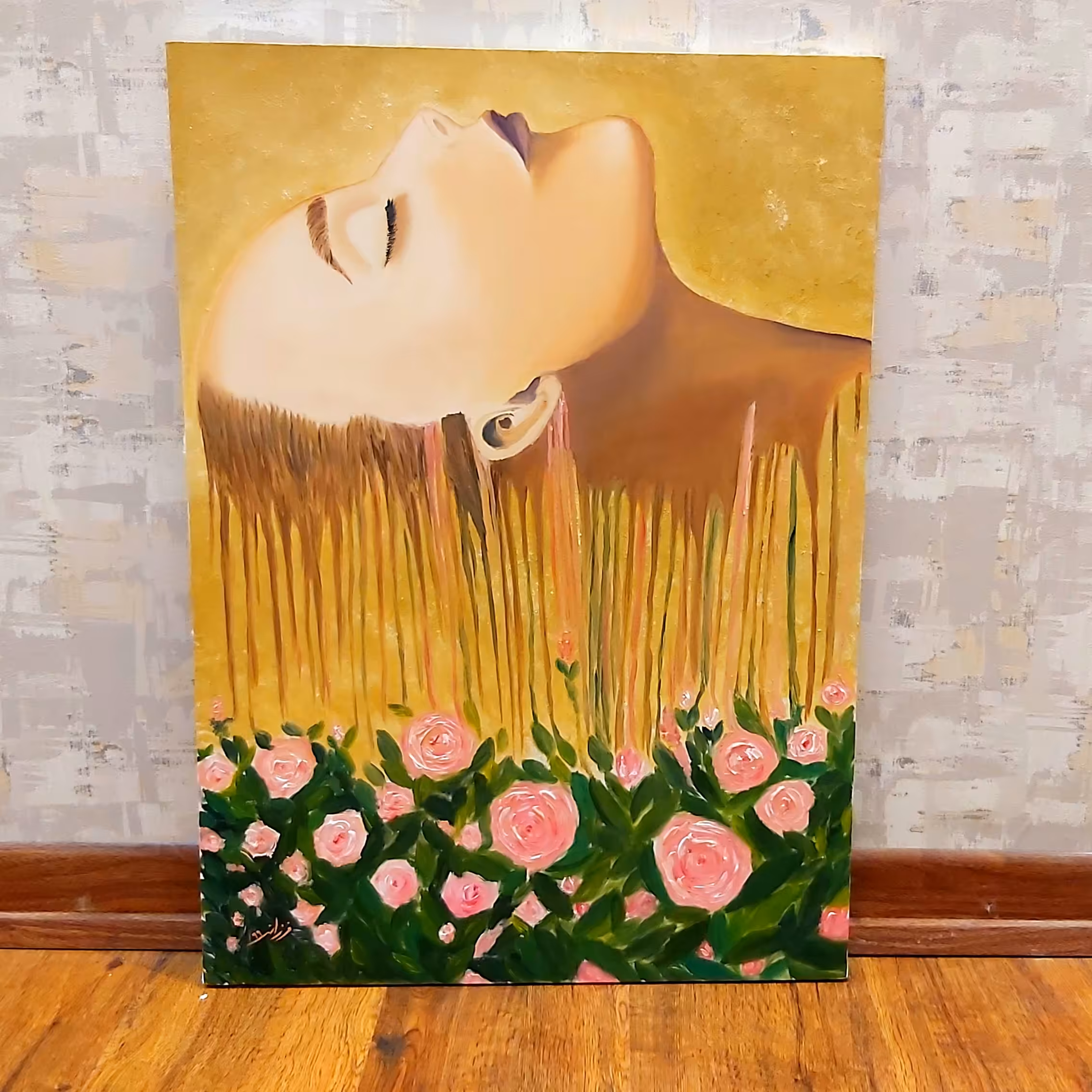 تابلو رنگ روغن دختر وگل همراه با قاب طلایی50در 70