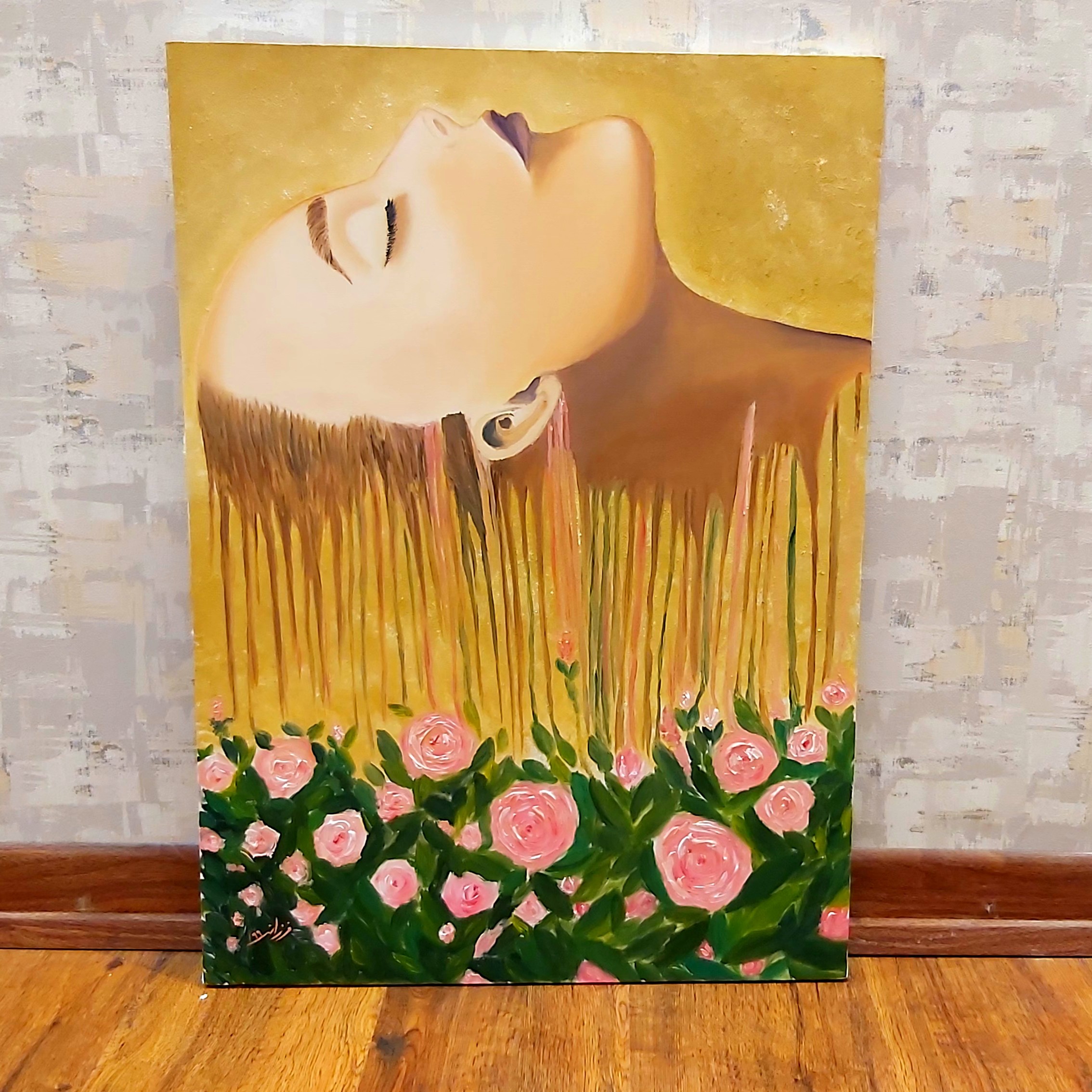 تابلو رنگ روغن دختر وگل همراه با قاب طلایی50در 70