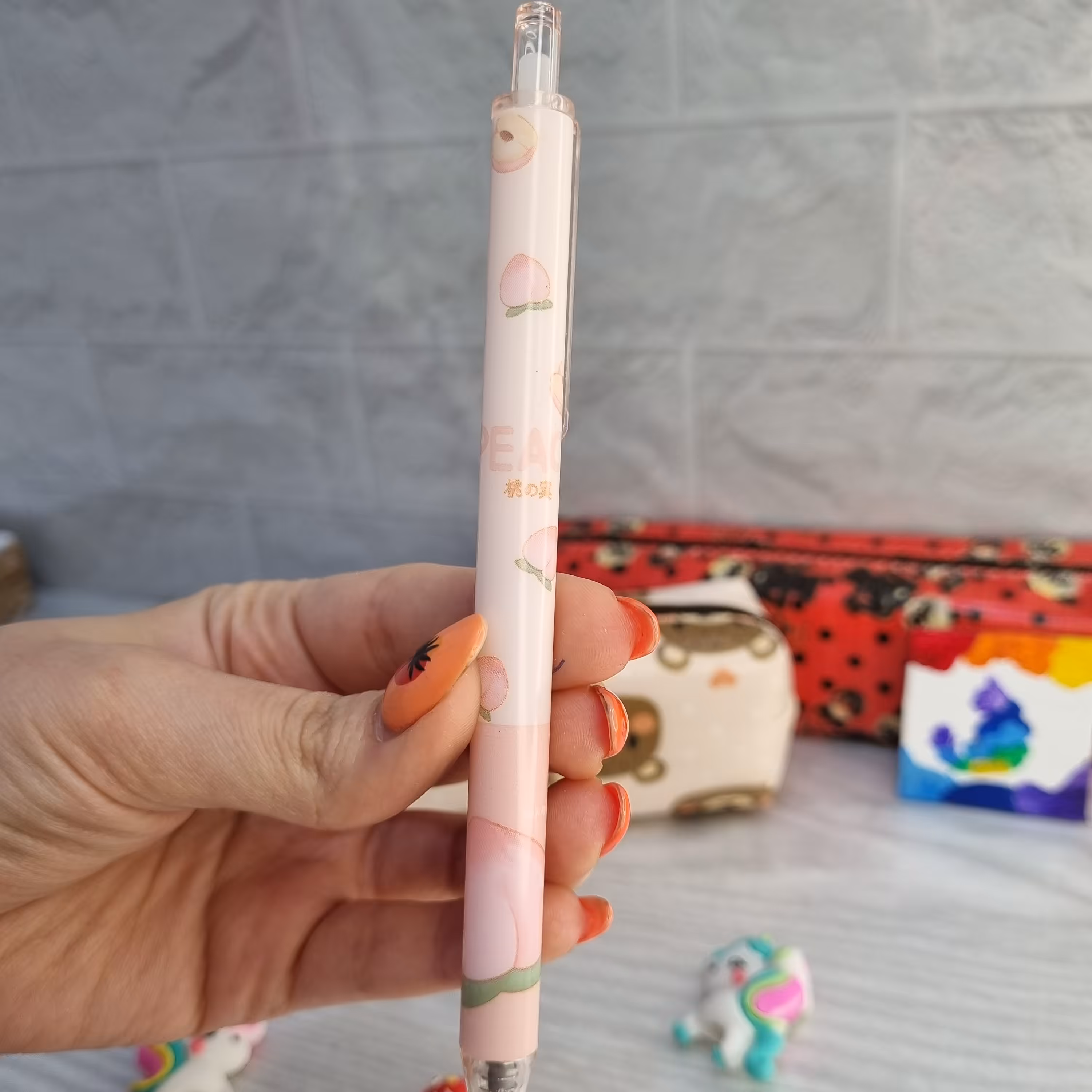 خودکار روان نویس فشاری طرح هلو با جوهر مشکی 