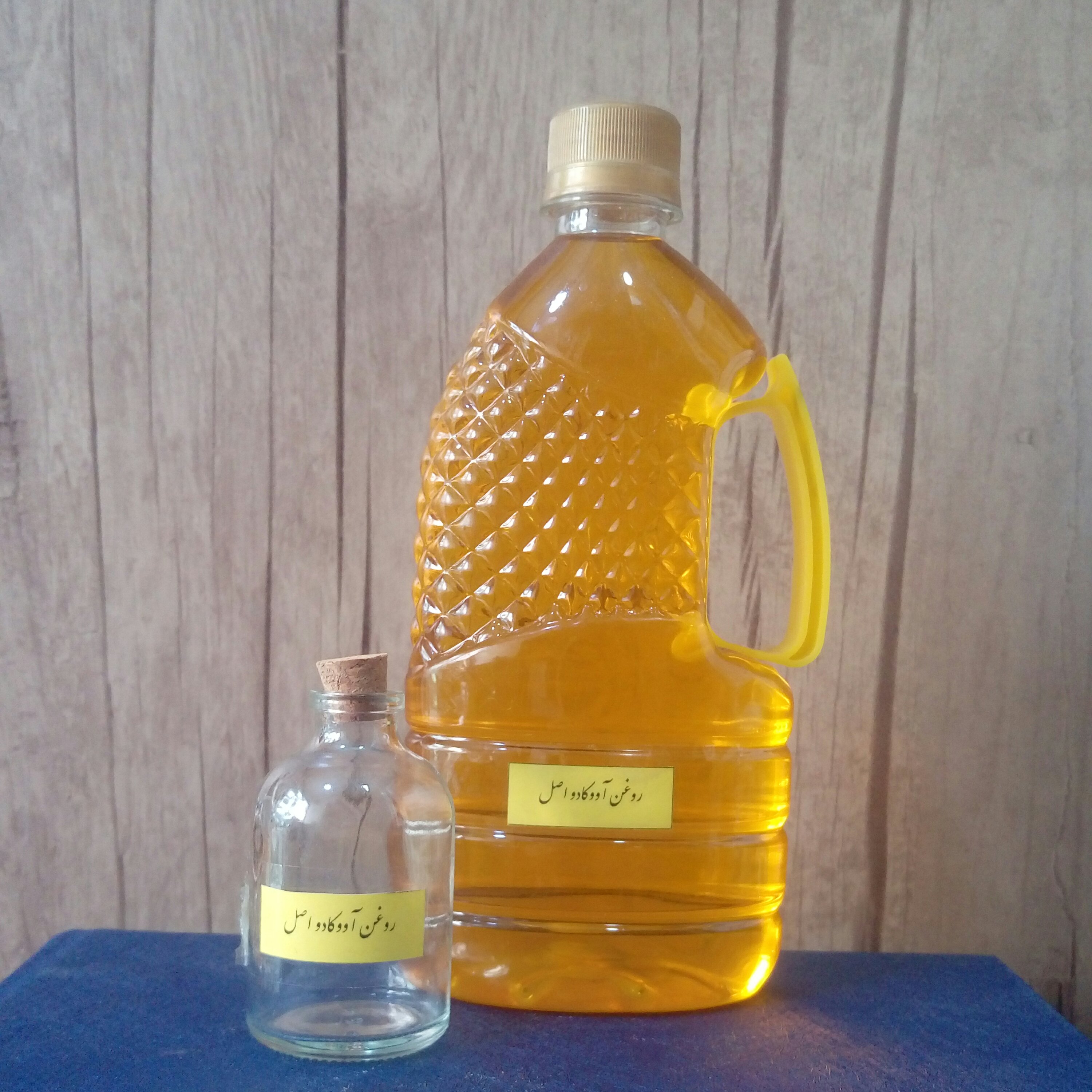روغن آووکادو اصل 65 میلی لیتر در ظروف شیشهای همراه با درب چوب پنبهای