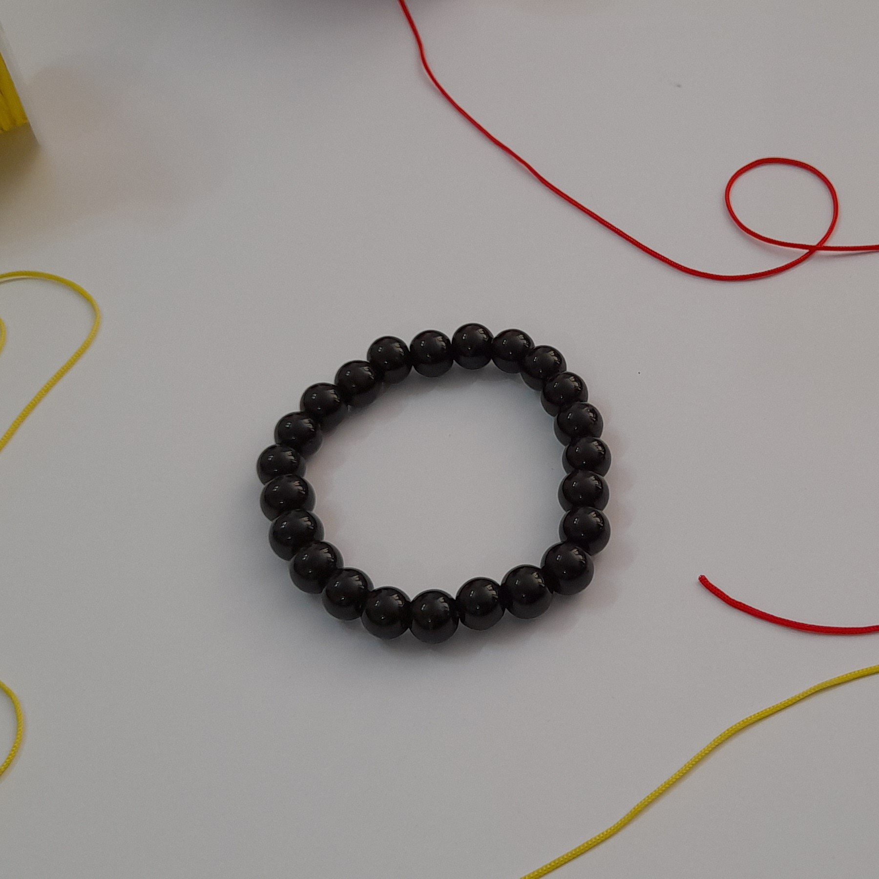 دستبند مرواریدی مشکی