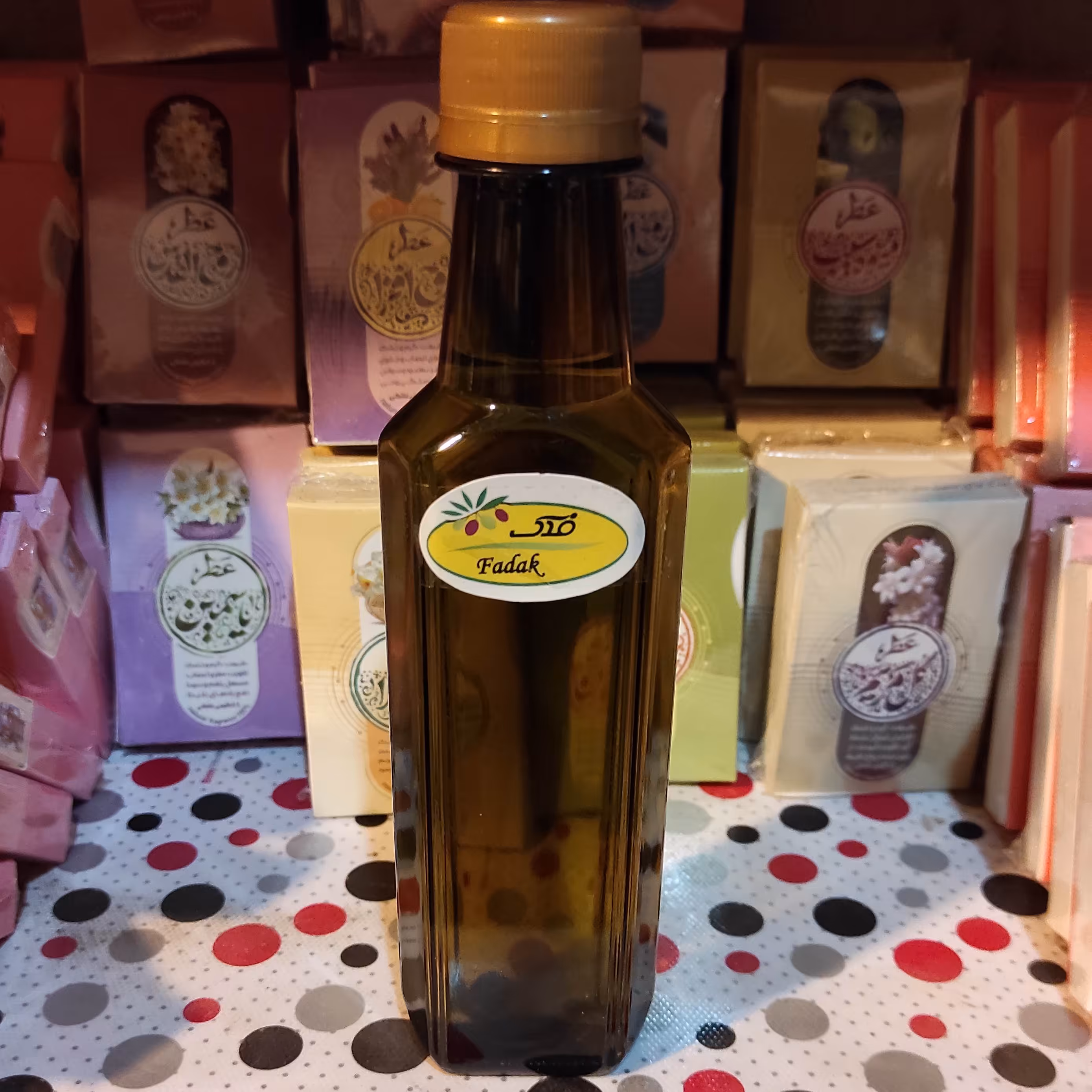 روغن زیتون فدک تهیه شده از زیتون مرغوب مزرعه زیتون قم