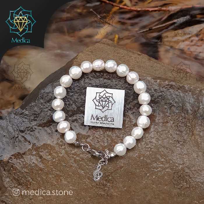 دستبند مروارید طبیعی(رنگ سفید تراش گرد)
سایز 8 سنگ و دور مچ 17 با قفل استیل