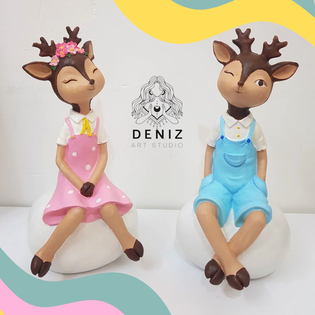 مجسمه پلی استر گوزن فانتزی دختر و پسر