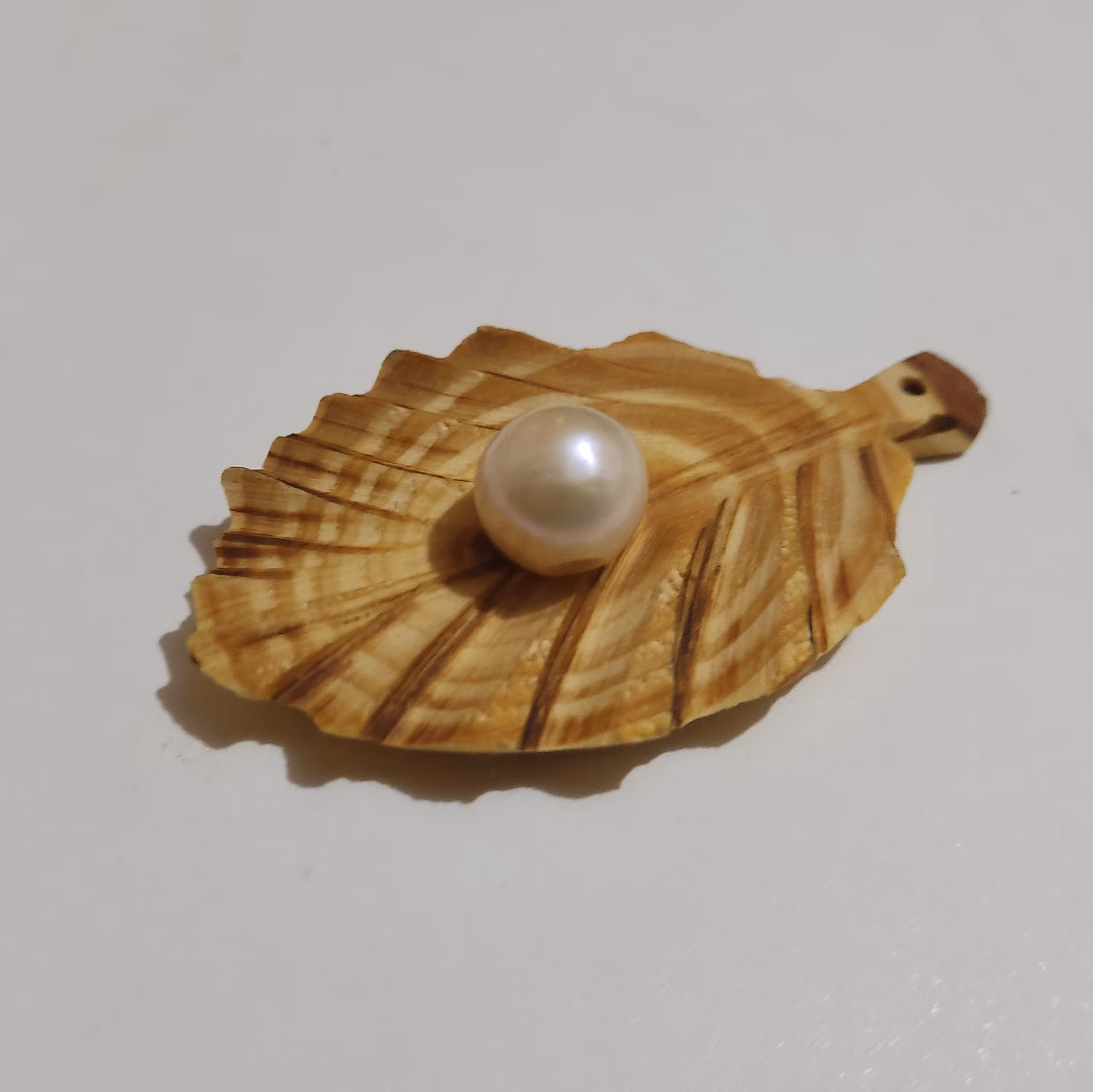 مروارید غلتان طبیعی و اصل به رنگ نباتی و صورتی کمرنگ 