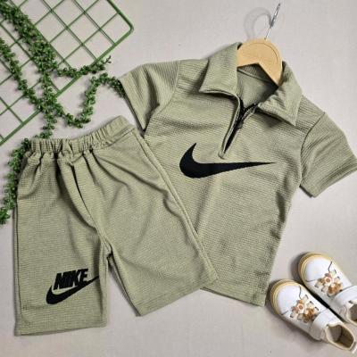 ست تیشرت و شلوارک بیسکویتی نیم زیپ NIKE