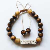 دستبند مدل عشق ابدی با سنگ چشم ببر و پلاک استیل مناسب هدیه به آقایان و خانم ها