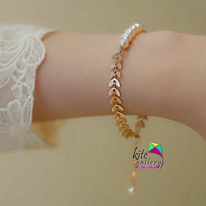 دستبند مروارید شل و زنجیر گندمی استیل