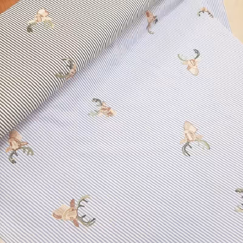 پارچه تترون ژاپن راه دار طرح گوزن (50 سانتی متر)