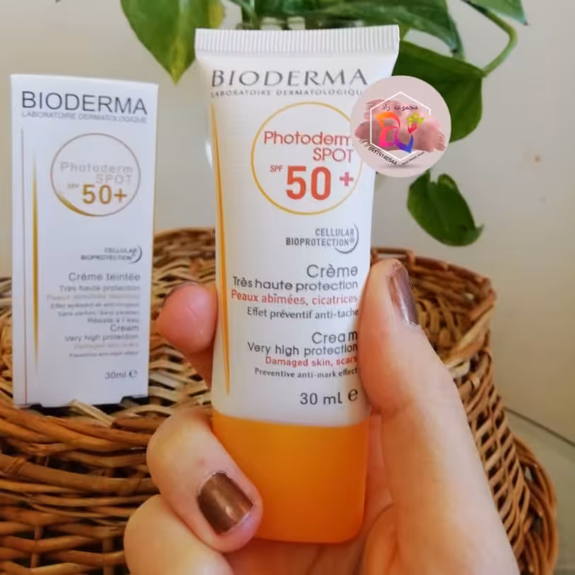 ضد آفتاب بیودرما کاملا بیرنگ اصلی لیبل قرمز 