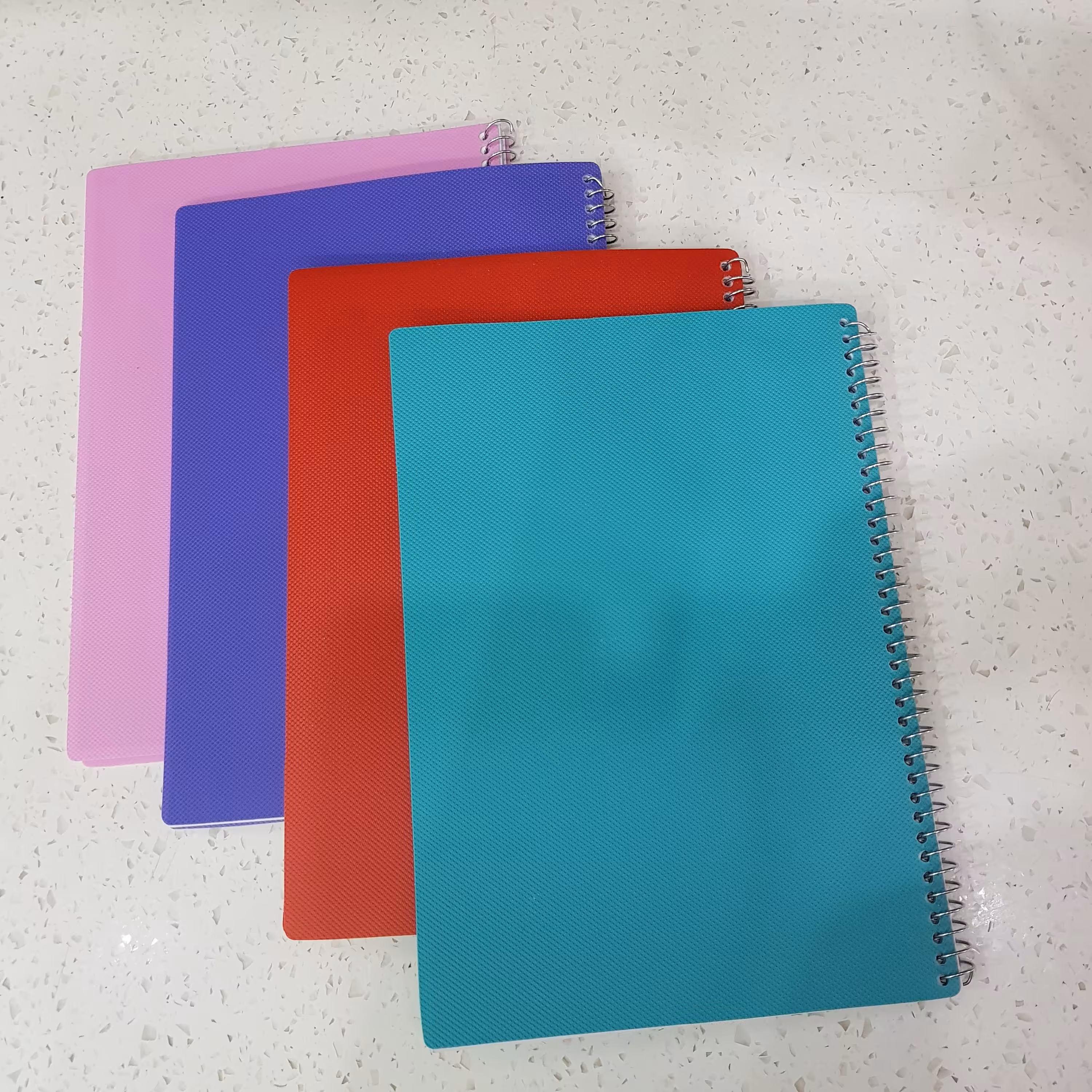 دفتر 50 برگ خط دار سیمی طلقی جلد رنگی دفتر مشق طلقی تک رنگ