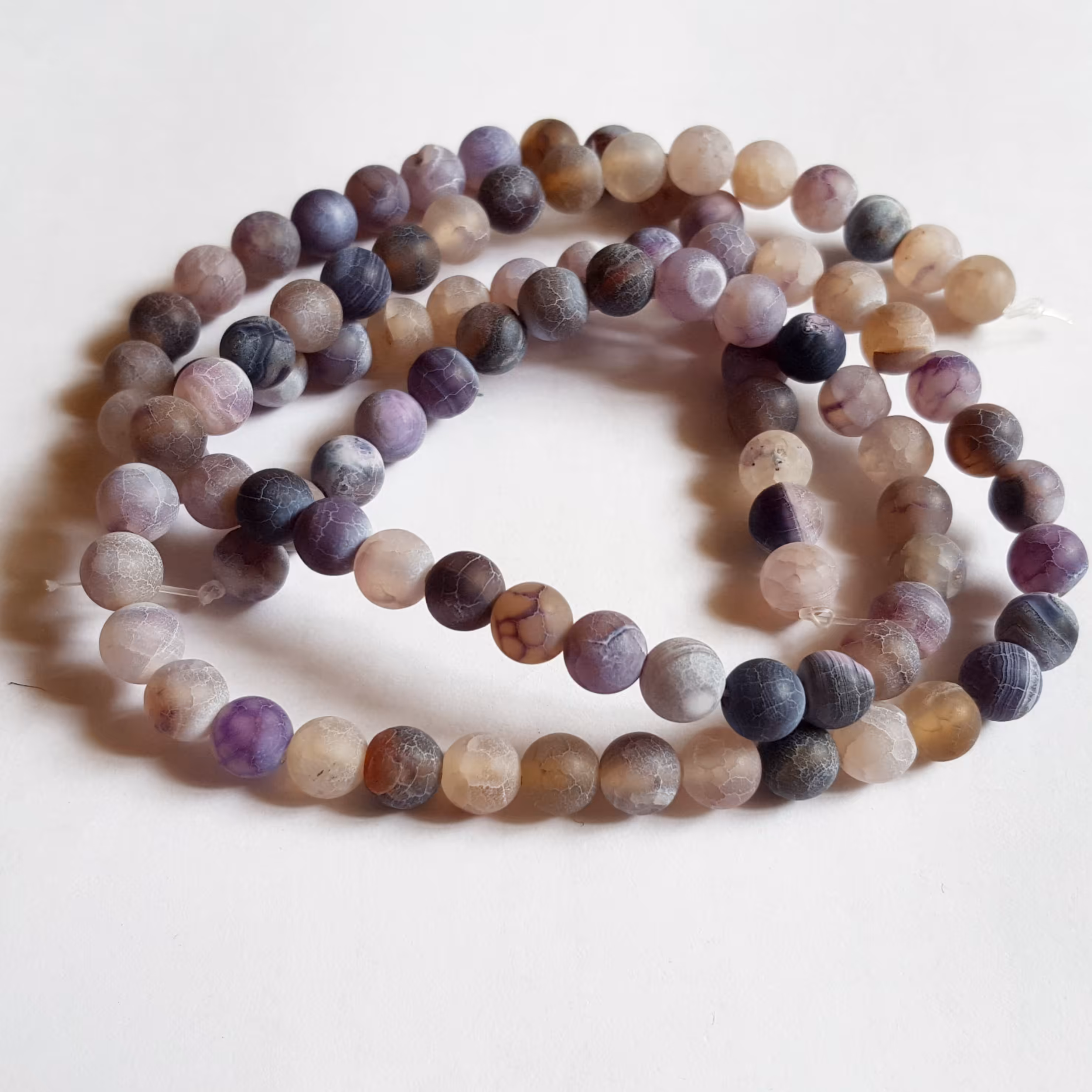 سنگ عقیق مات بنفش(سایز8)-2 ریسه