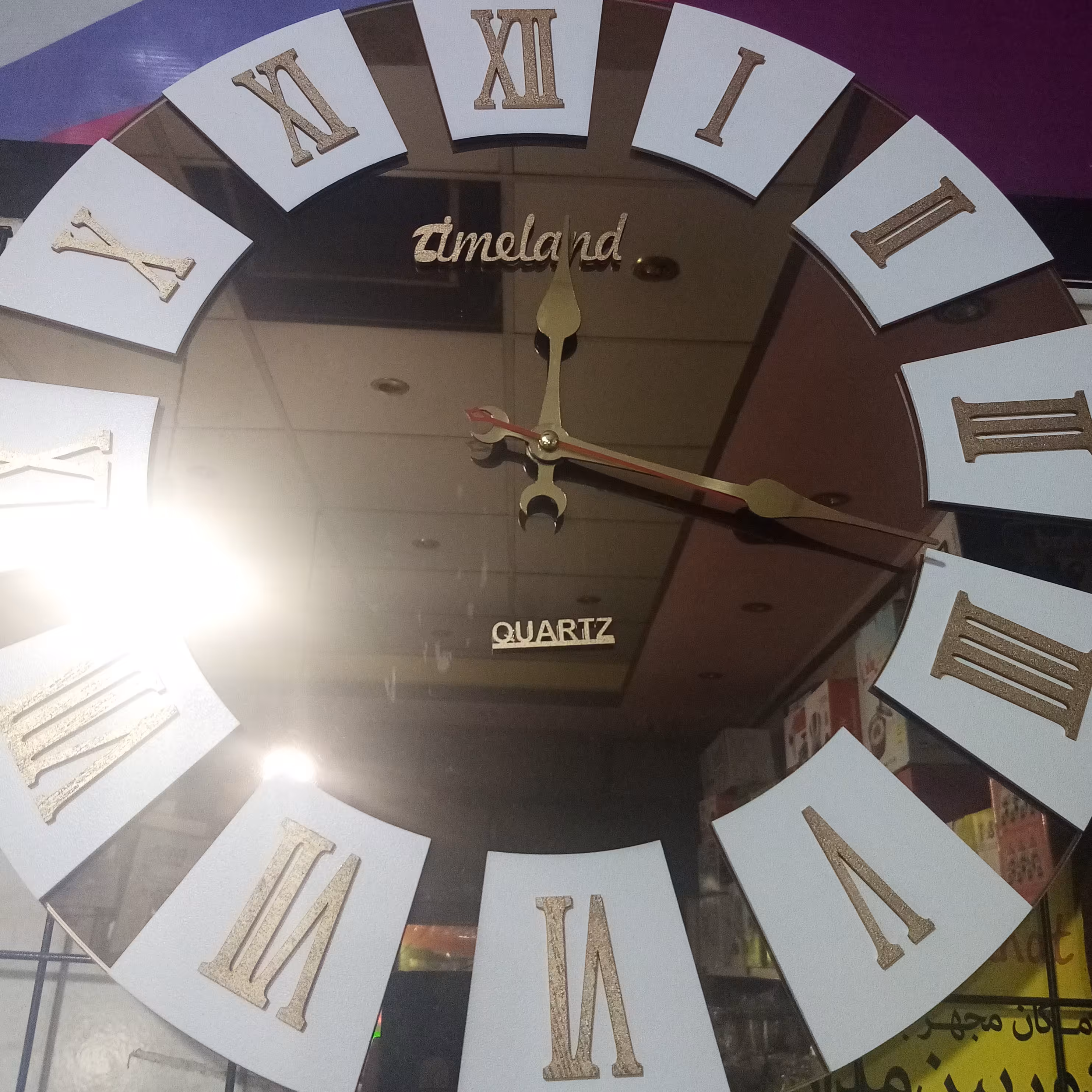 ساعت دیواری آینه