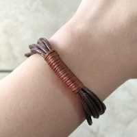 دستبند چرم وسط بافت