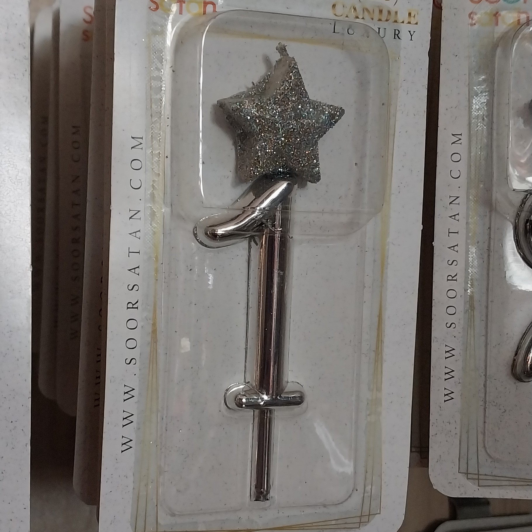 شمع تاج دار  و ستاره دارنقره ای عدد 1