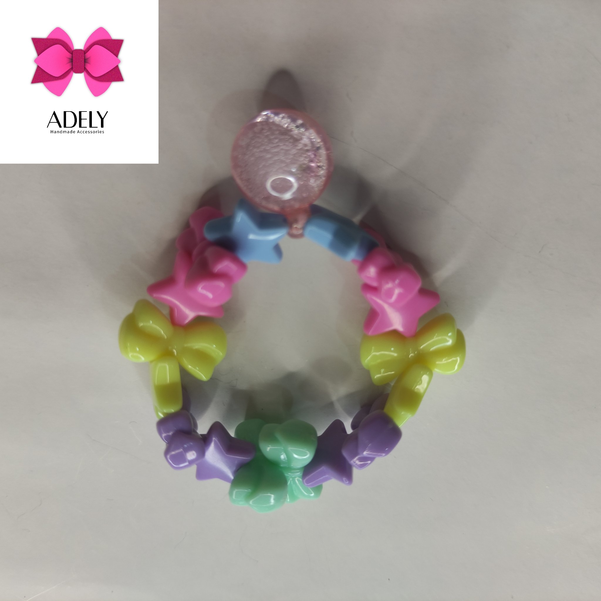 دستبند مهره پاپیون و ستاره و آویز گوی کد404