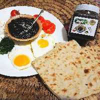 معجون نایج ارده‌سیاهدانه شیرین شده با شکر قهوه‌
مقوی و محرّک قوه‌ی باه
(400گرمی)