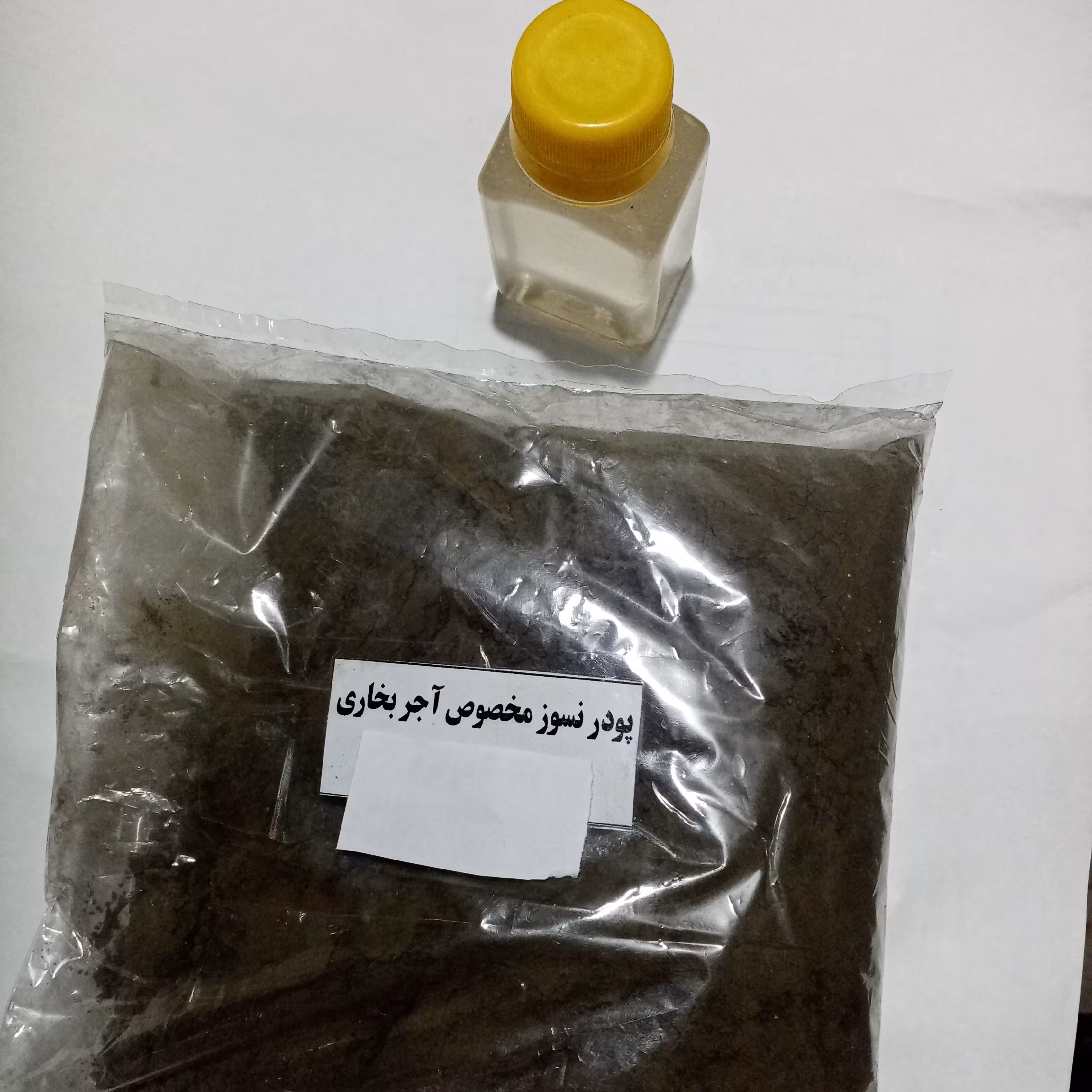 چسب نسوز به همراه 100 گرم پودر نسوز جهت آجر شومینه یا» ر5