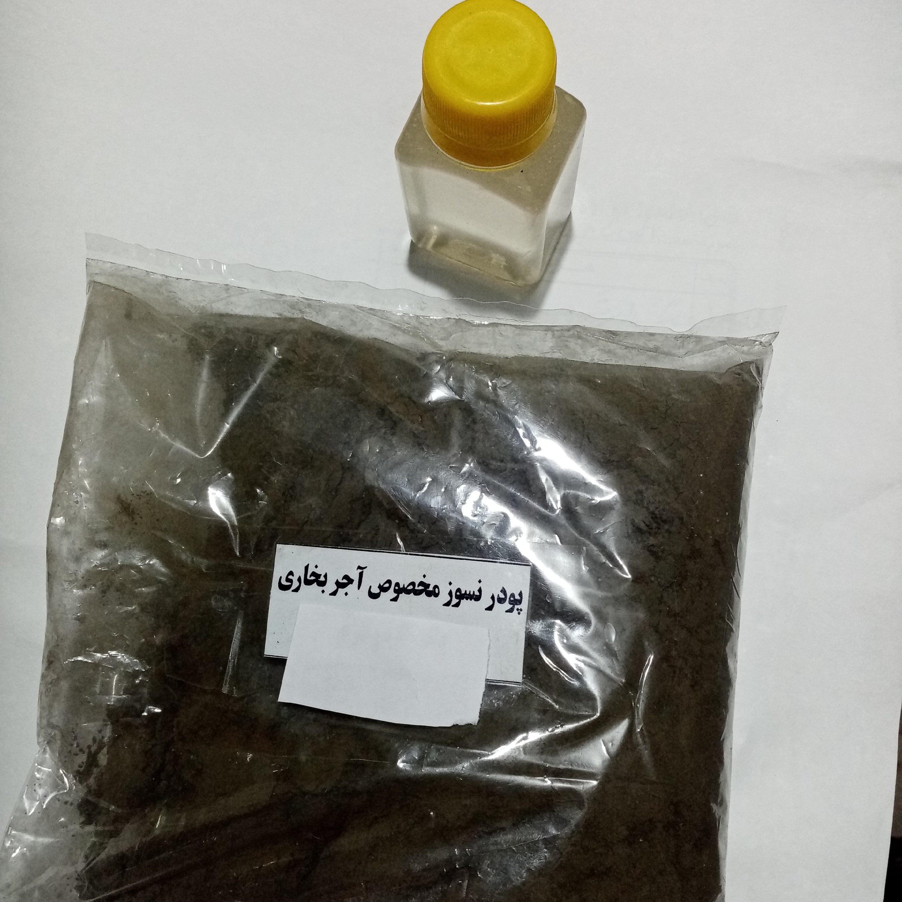 چسب نسوز به همراه 100 گرم پودر نسوز جهت آجر شومینه یا» ر5