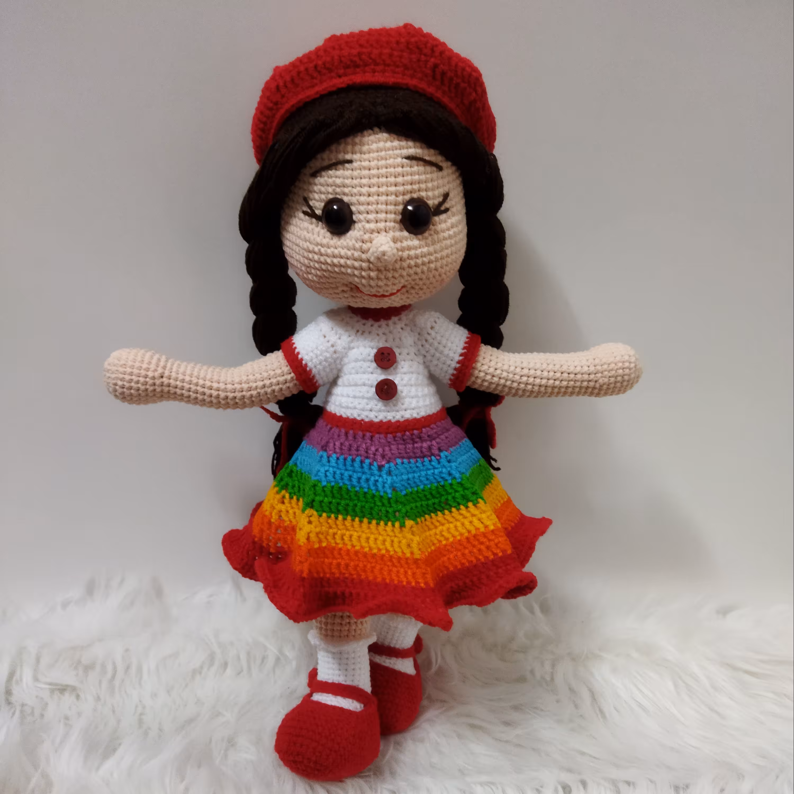 عروسک بافتنی دختر رنگین کمان کلاهدار 