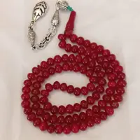 تسبیح 101 عددی کهربای زرشکی 