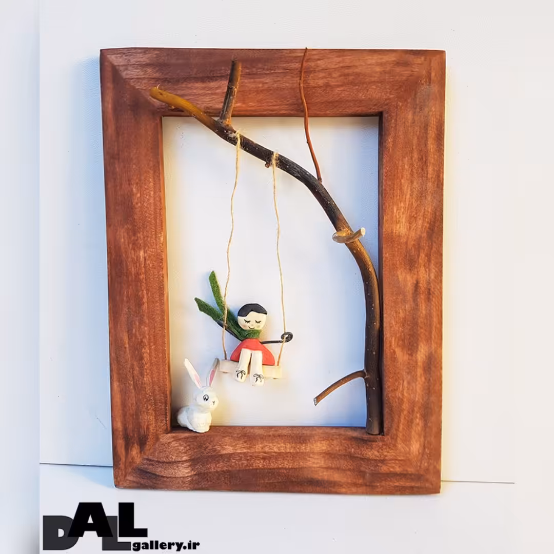 قاب چوبی دکوری دختر تاب سوار با خرگوش  چوبی پیکرتراشی دست ساز ( دستساز ) تزیینی ( تابلو چوبی ) 