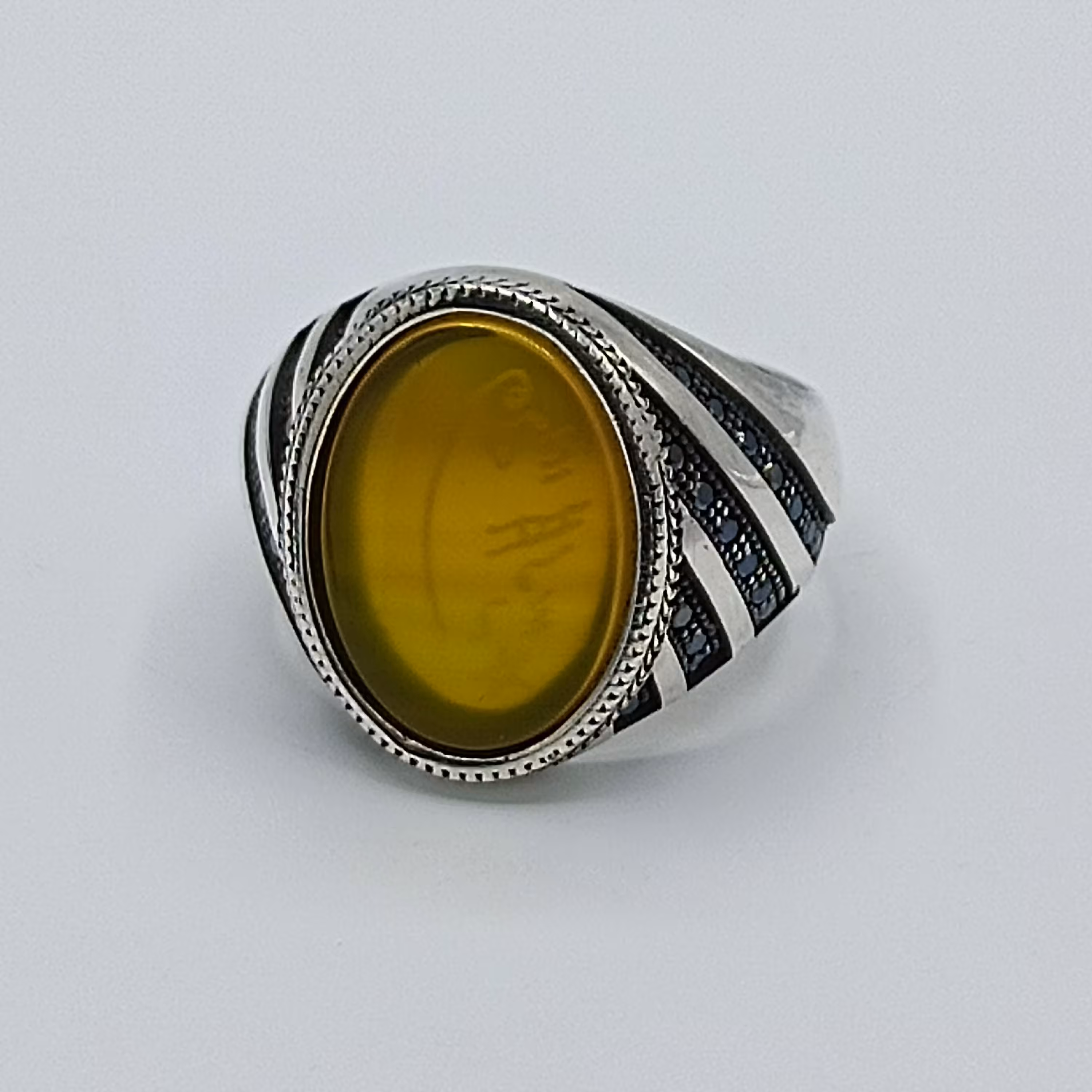 انگشتر نقره مردانه طرح تُرک مخراج کاری نگین عقیق زرد شرف الشمس کد 1133