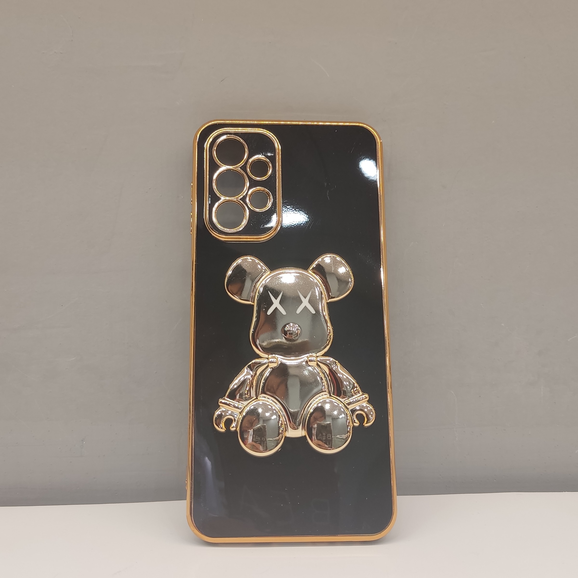 گارد گوشی مدل   A23 4gخرسی مشکی طلایی برجسته استندی
