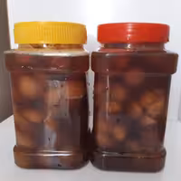 سیر ترشی خانگی 3ساله، با سرکه طبیعی و محلی، ترکیب سیب و انگور، بدون شکر، بسیار خوش طعم