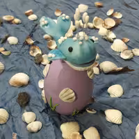 تخم مرغ سفالی با تزیئن نهنگ نماد سال جدید قابل شستشو 