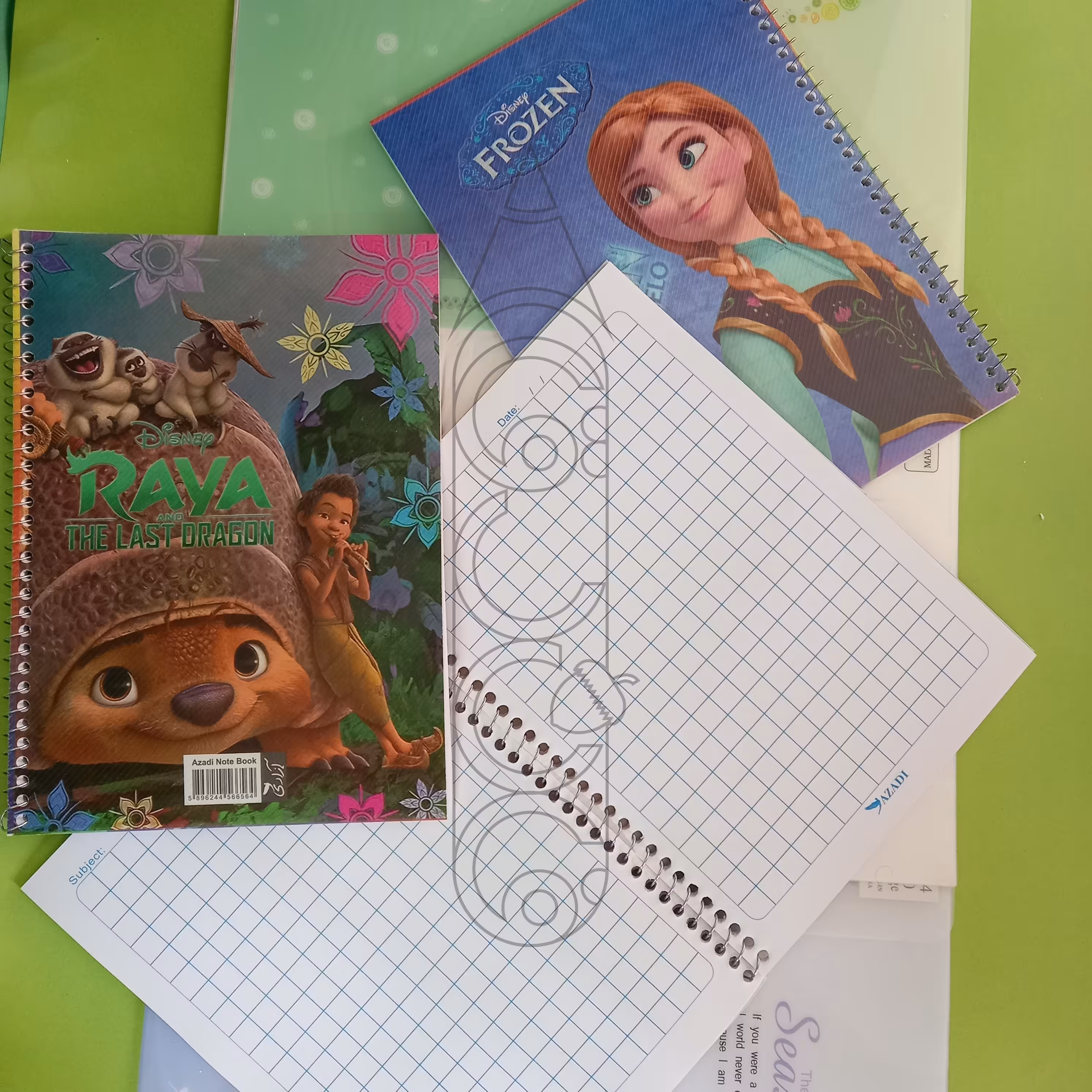 دفتر 50برگ شطرنجی خانه درشت فنری جلد طلقی(جهت مهد کودک)