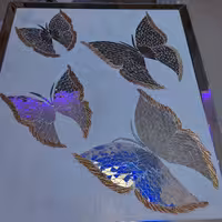 تابلو دکوراتیو و آینه کاری کوچ پروانه