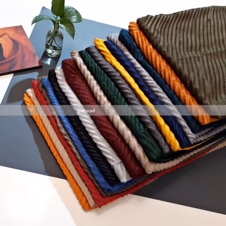 شال پلیسه عرض70وطول200سانت 4فصل   ایستایی نسبتا خوب دوردوخت منگوله دار 