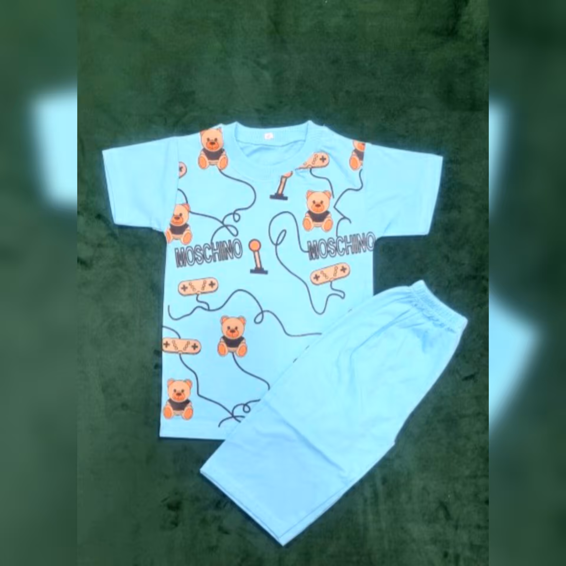 ست دوتیکه تی شرت و شورتک پسرانه طرح خرس 