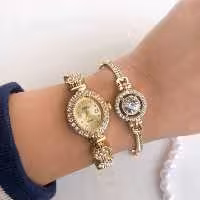 ساعت بند استیل زنانه به همراه دستبند