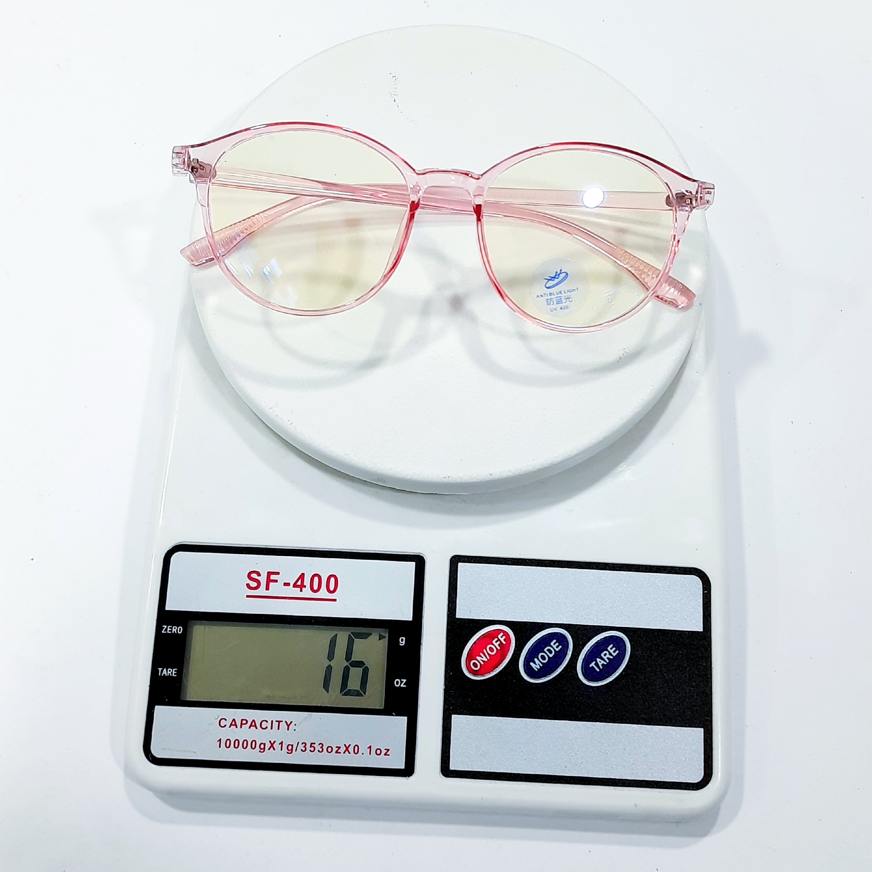 عینک بلوکات بدون نمره ندارد گرد رنگ صورتی گلبهی  مخصوص کار با کامپیوتر و گوشی موبایل همراه با جلد و دستمال عینک 