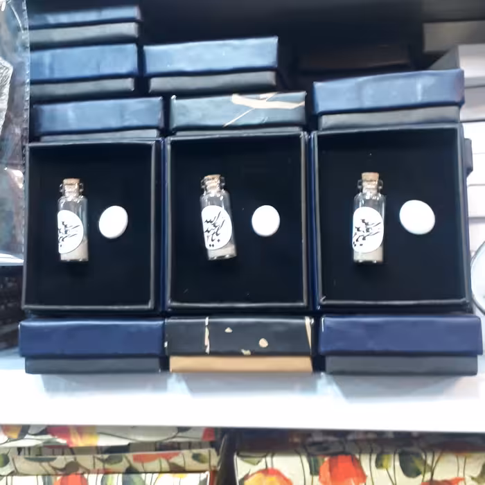 سنگ حرم مطهر حضرت اباالفضل العباس علیه السلام به همراه تربت