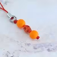 آویز موبایل فانتزی طرح جمجمه کد CBP-202 - نارنجی