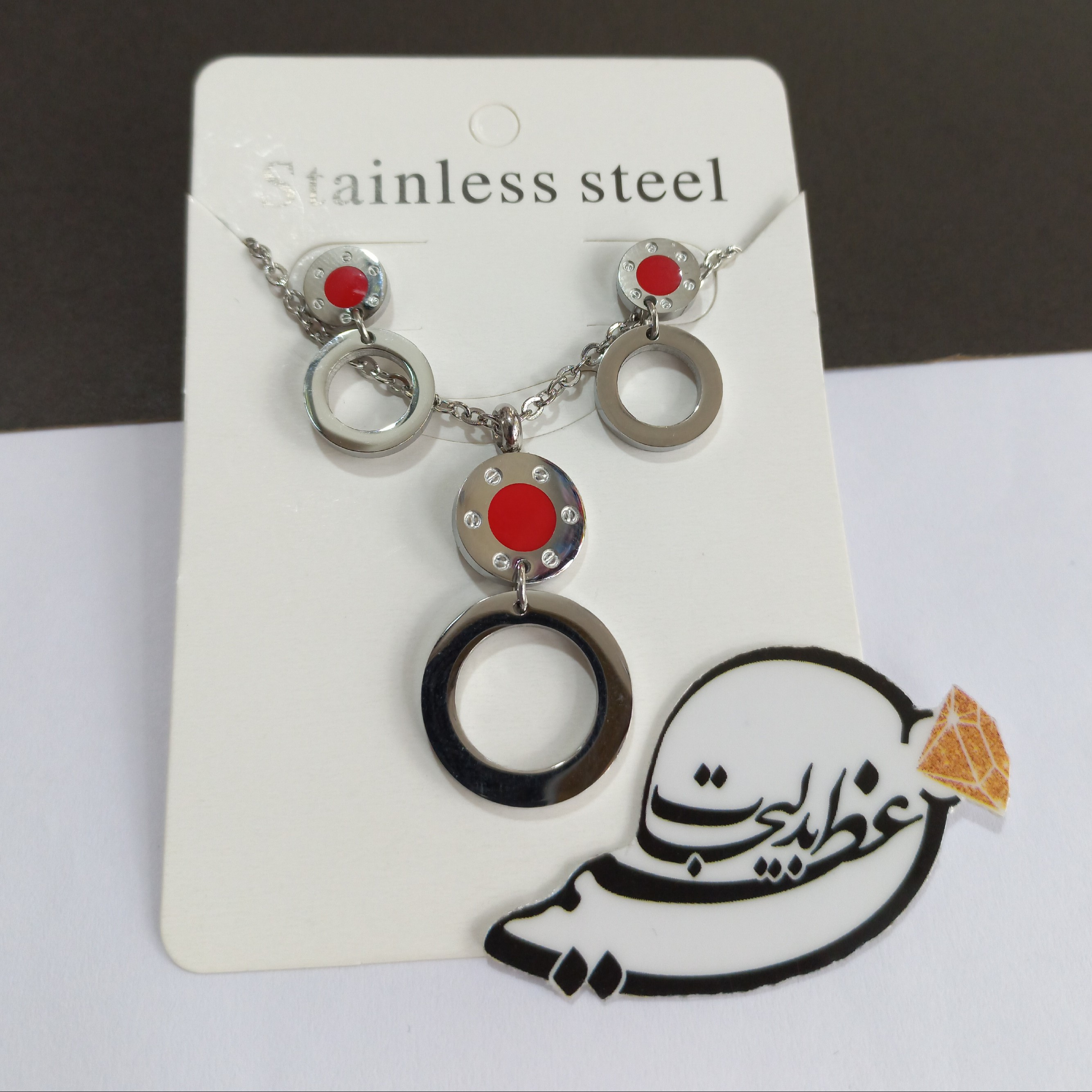 نیم ست  استیل رنگ ثابت درجه یک بسیار زیبا طرح دو دایره شیک و جذاب و باکیفیت با زنجیر 45 سانتی