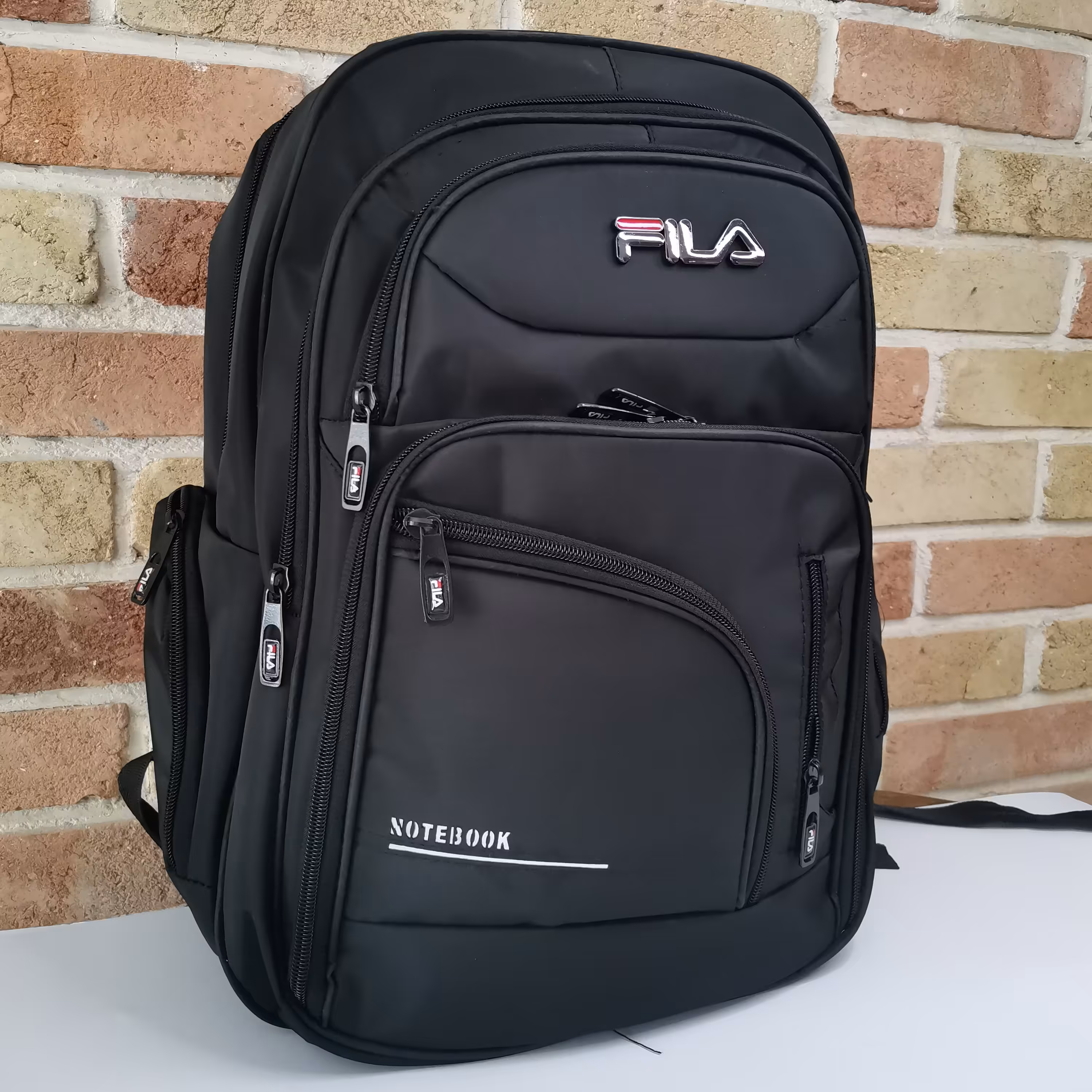 کیف کوله پشتی مدرسه برزنتی فیلا FILA