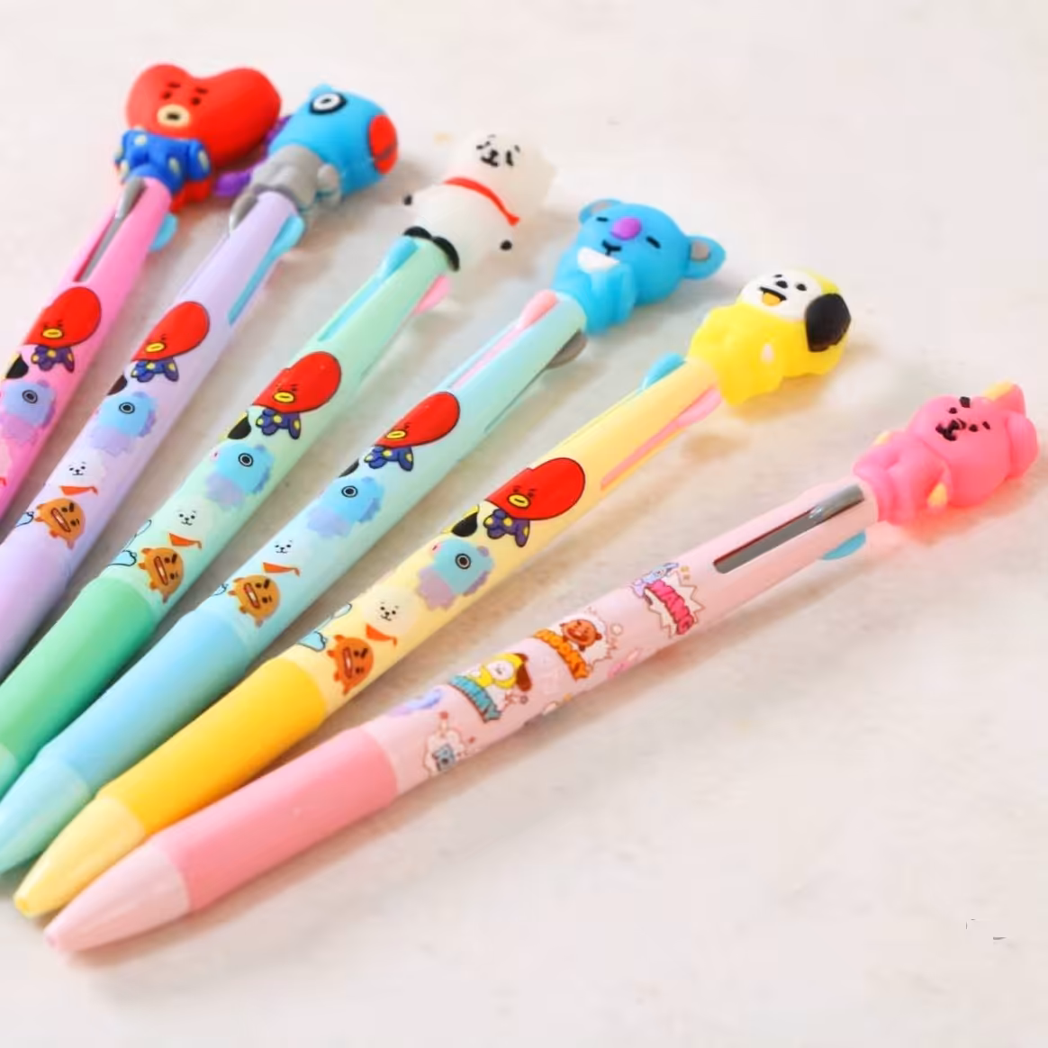 خودکار 3 رنگ همراه با سری سیلیکونی در طرح های مختلف 