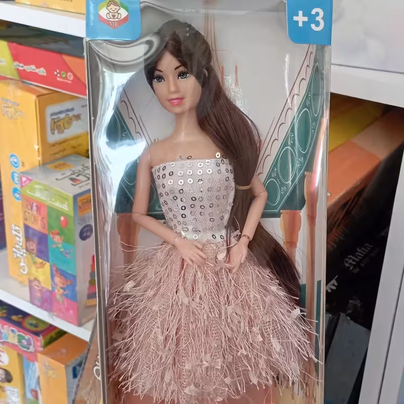 اسباب بازی باربی با لباس مجلسی