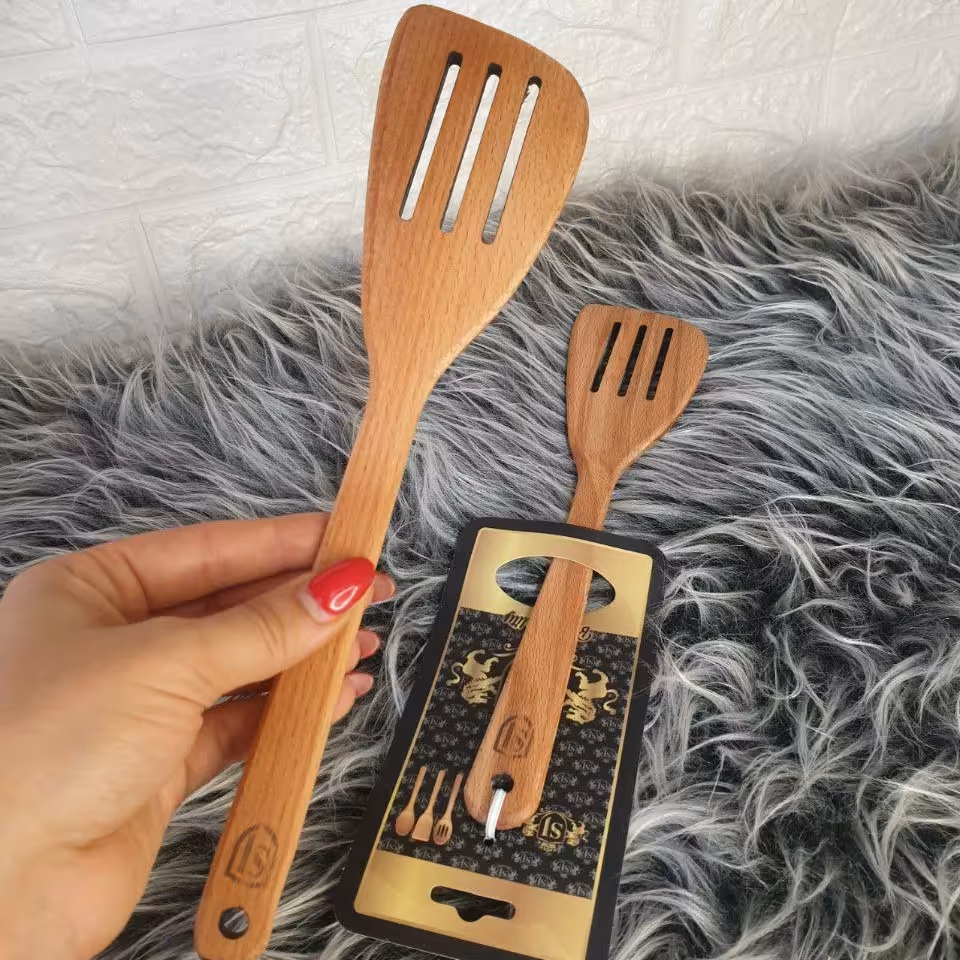 کفگیر چوبی سرکج شیاردار 113sj
کد عبدی 